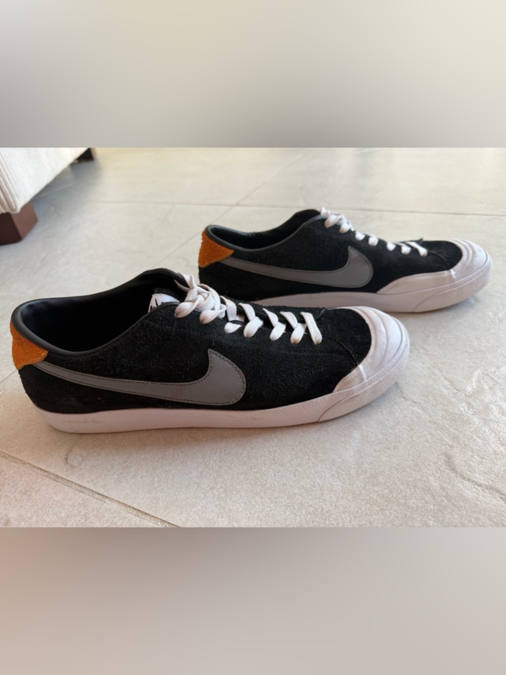 Nike Black Suede Low-Top Sneakers with Gray Swoosh and Orange Heel Tab